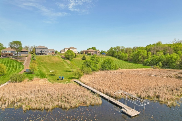 26042 Sunset Dr, Chisago City, MN 55013 - view of yard featuring a water view and a dock