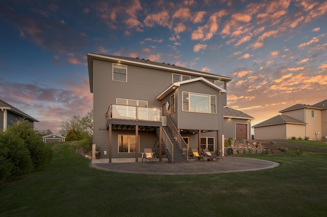 26042 Sunset Dr, Chisago City, MN 55013 - rear view of house featuring a patio, a yard, a deck, and stairway