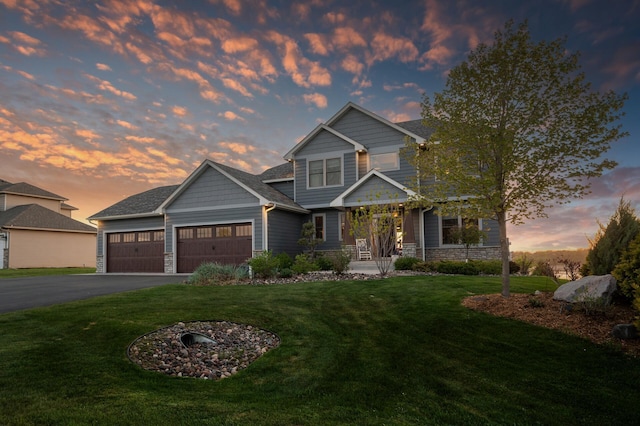 26042 Sunset Dr, Chisago City, MN 55013 - craftsman house with a garage, stone siding, driveway, and a front yard