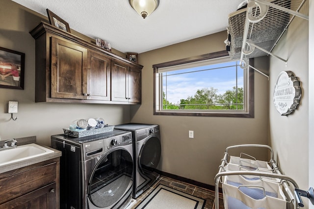 26042 Sunset Dr, Chisago City, MN 55013 - laundry room with cabinet space and washing machine and dryer