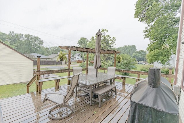 408 Lafayette Ave, Fulda, MN 56131 - wooden deck with outdoor dining area, a pergola, a yard, and a grill
