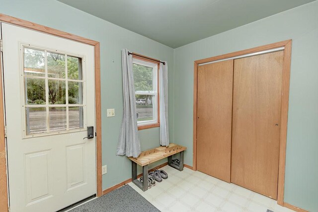 408 Lafayette Ave, Fulda, MN 56131 - doorway featuring tile patterned floors and baseboards