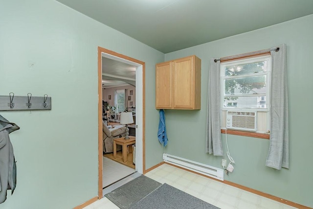 408 Lafayette Ave, Fulda, MN 56131 - interior space featuring a baseboard heating unit, light flooring, healthy amount of natural light, and cooling unit