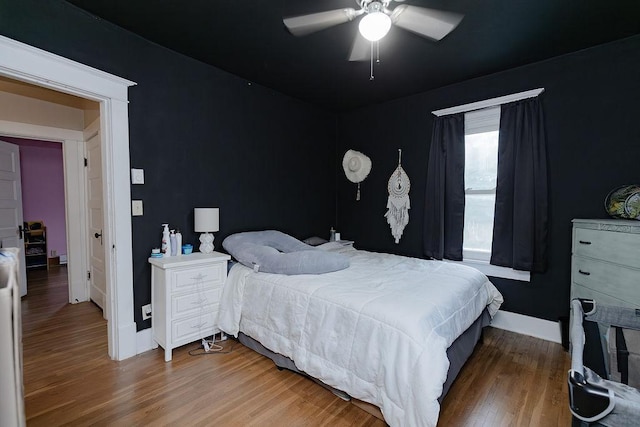 408 Lafayette Ave, Fulda, MN 56131 - bedroom featuring wood finished floors and a ceiling fan