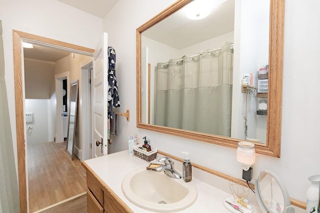 408 Lafayette Ave, Fulda, MN 56131 - bathroom featuring vanity and wood finished floors