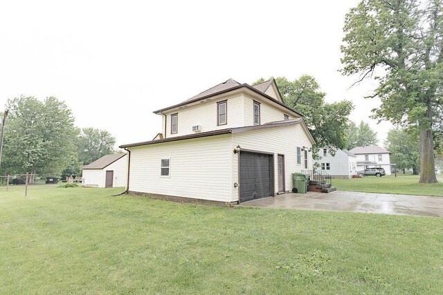 408 Lafayette Ave, Fulda, MN 56131 - view of home's exterior featuring concrete driveway and a lawn