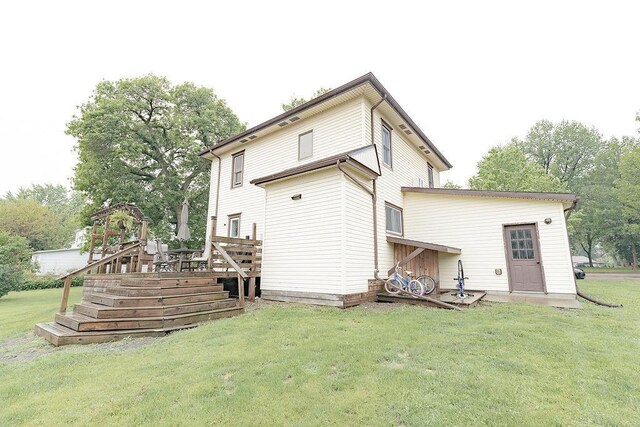 408 Lafayette Ave, Fulda, MN 56131 - back of house with a wooden deck and a lawn