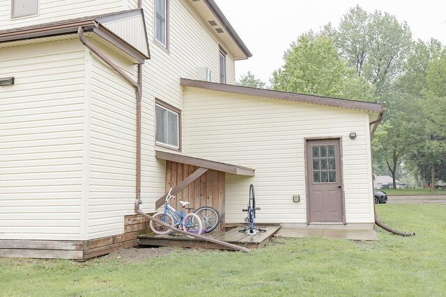 408 Lafayette Ave, Fulda, MN 56131 - rear view of property featuring a yard