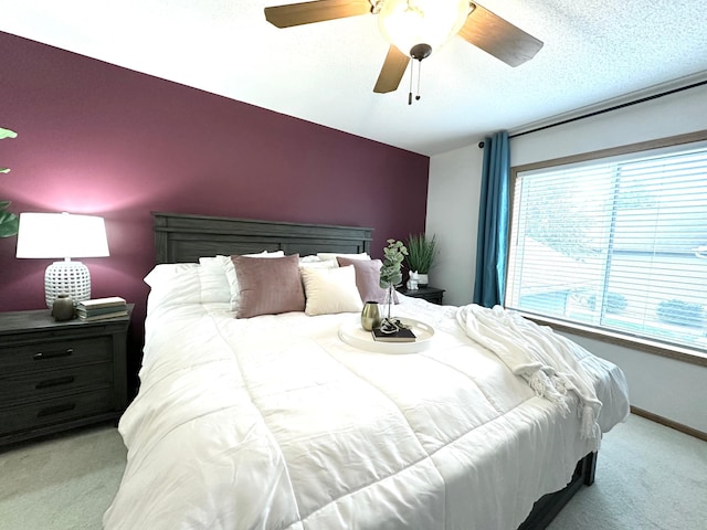 12224 Radisson Rd NE, Blaine, MN 55449 - bedroom with carpet floors, ceiling fan, and baseboards