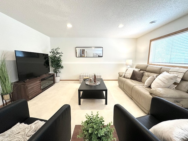 12224 Radisson Rd NE, Blaine, MN 55449 - carpeted living area with a textured ceiling and recessed lighting