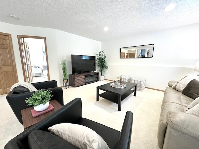 12224 Radisson Rd NE, Blaine, MN 55449 - living room with carpet floors, a textured ceiling, and recessed lighting