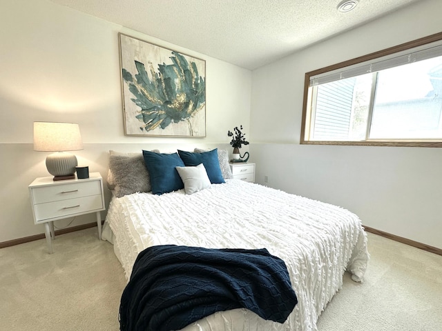 12224 Radisson Rd NE, Blaine, MN 55449 - carpeted bedroom with a textured ceiling and baseboards