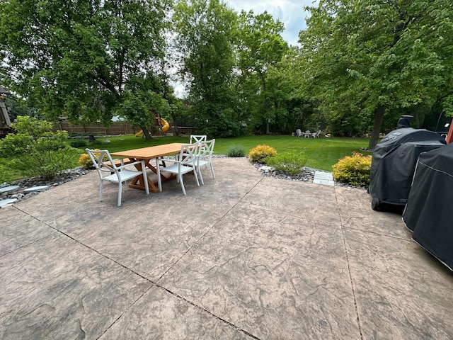 12224 Radisson Rd NE, Blaine, MN 55449 - view of patio / terrace featuring outdoor dining space