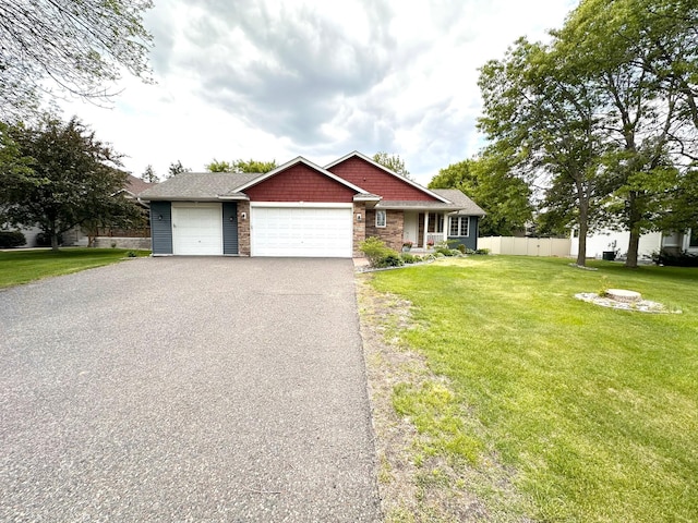 12224 Radisson Rd NE, Blaine, MN 55449 - craftsman house featuring a garage and driveway