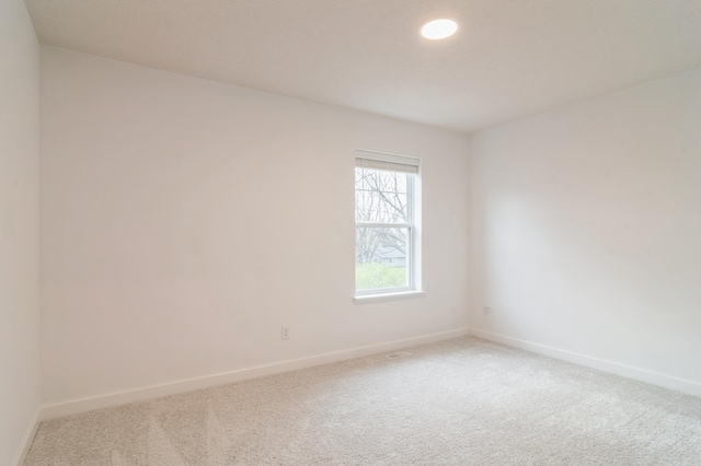 23062 Hazel Ln, Rogers, MN 55369 - carpeted empty room featuring baseboards and recessed lighting