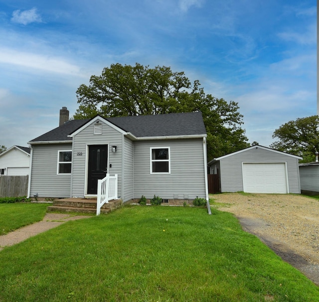 705 1st Ave SE, Pine Island, MN 55963 - view of front of property featuring an outbuilding, dirt driveway, a detached garage, and a chimney