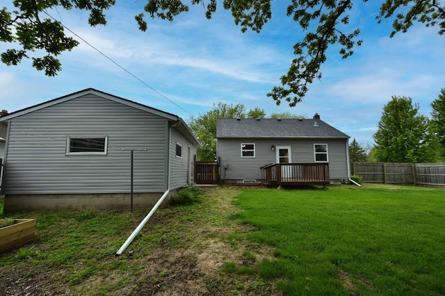 705 1st Ave SE, Pine Island, MN 55963 - rear view of house with a wooden deck
