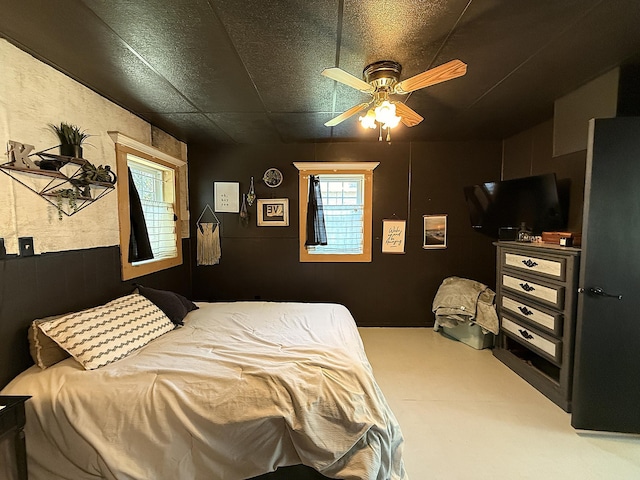 206 Oscar Ave N, Canby, MN 56220 - bedroom featuring finished concrete flooring and a ceiling fan
