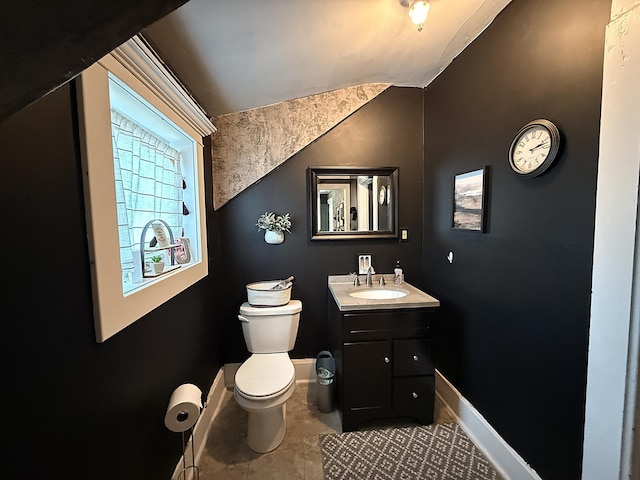 206 Oscar Ave N, Canby, MN 56220 - bathroom featuring lofted ceiling and vanity