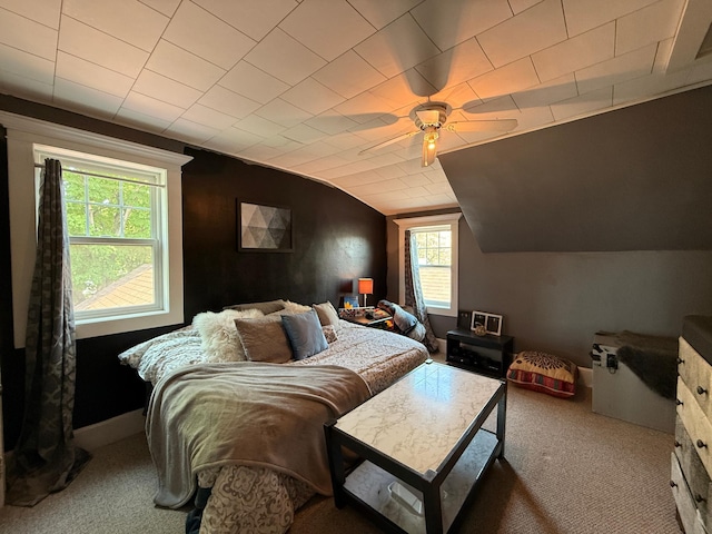 206 Oscar Ave N, Canby, MN 56220 - carpeted bedroom with lofted ceiling and ceiling fan