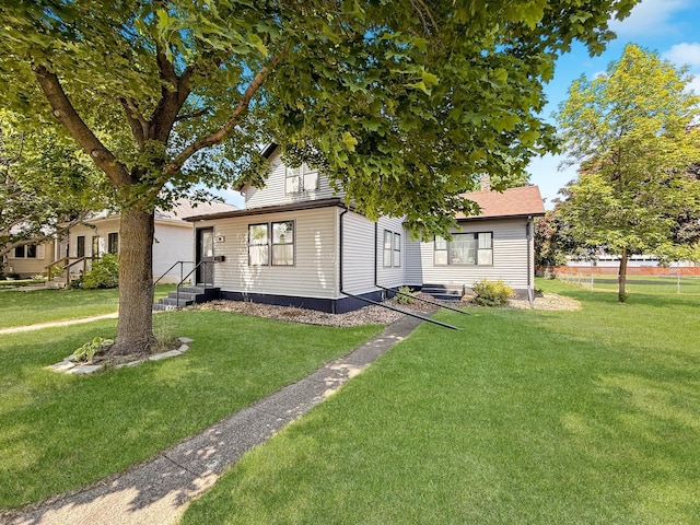 206 Oscar Ave N, Canby, MN 56220 - view of front facade featuring a front lawn