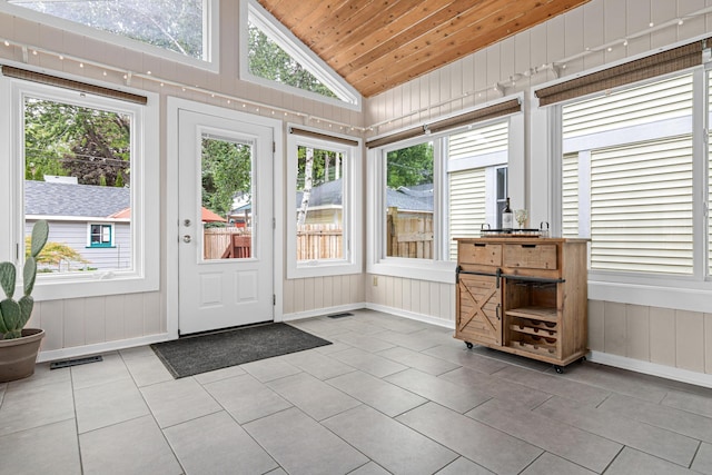 1391 Jefferson Ave, Saint Paul, MN 55105 - unfurnished sunroom featuring vaulted ceiling and plenty of natural light