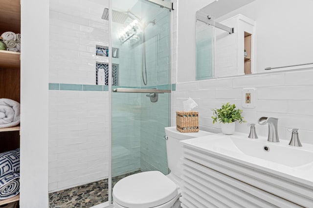 1391 Jefferson Ave, Saint Paul, MN 55105 - full bathroom featuring toilet, a shower stall, vanity, and tile walls