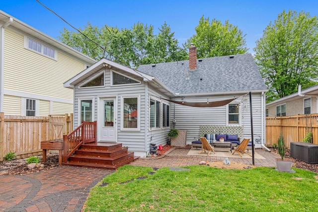 1391 Jefferson Ave, Saint Paul, MN 55105 - rear view of property with outdoor lounge area, a patio area, a chimney, and a shingled roof