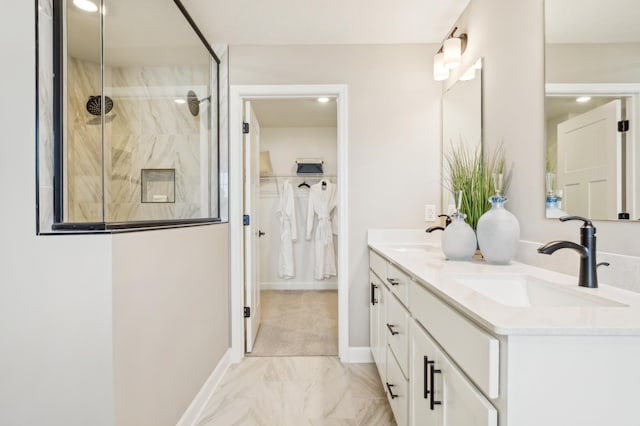 6601 Tamarack Ln, Corcoran, MN 55340 - full bath featuring tiled shower, double vanity, marble finish flooring, a walk in closet, and recessed lighting