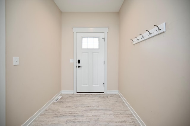 1160 21st St, Wabasha, MN 55981 - entryway with light wood-style flooring and baseboards