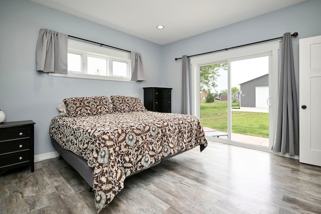 1160 21st St, Wabasha, MN 55981 - bedroom featuring access to exterior, wood finished floors, recessed lighting, and baseboards