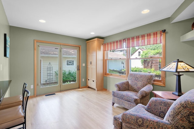 5136 16th Ave S, Minneapolis, MN 55417 - living room featuring plenty of natural light, light wood-type flooring, recessed lighting, and baseboards