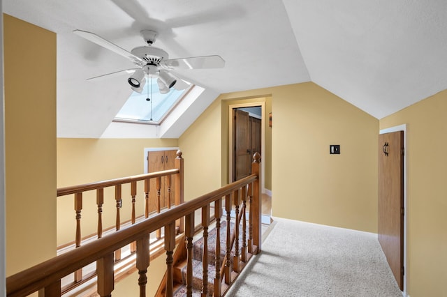 5136 16th Ave S, Minneapolis, MN 55417 - hall with an upstairs landing, a skylight, lofted ceiling, and light carpet