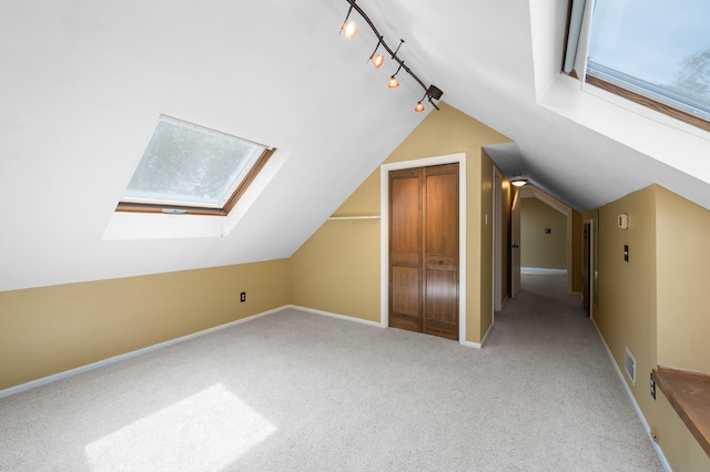 5136 16th Ave S, Minneapolis, MN 55417 - additional living space with lofted ceiling, carpet, a skylight, and baseboards