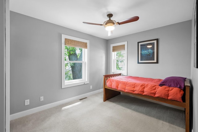 5136 16th Ave S, Minneapolis, MN 55417 - bedroom with baseboards, carpet flooring, and ceiling fan