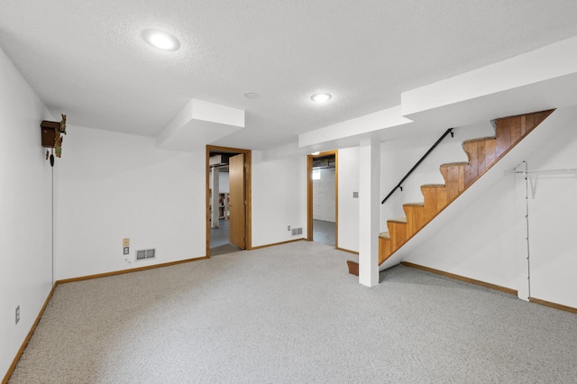 5136 16th Ave S, Minneapolis, MN 55417 - finished below grade area with baseboards, carpet, stairway, a textured ceiling, and recessed lighting