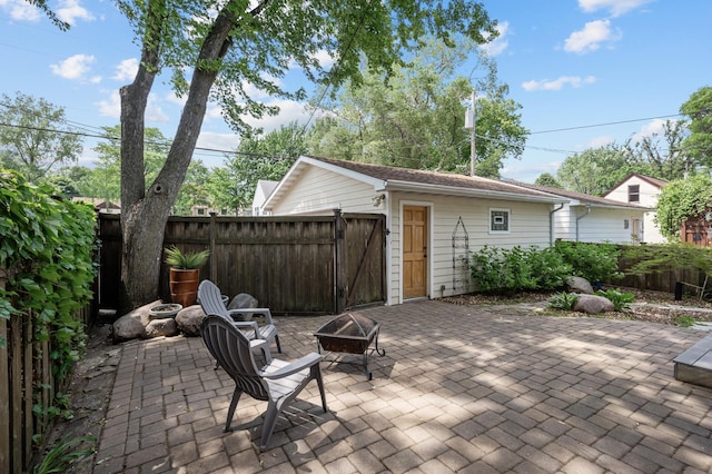5136 16th Ave S, Minneapolis, MN 55417 - view of patio with an outdoor fire pit and a gate