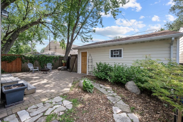 5136 16th Ave S, Minneapolis, MN 55417 - rear view of house featuring a patio and a fire pit