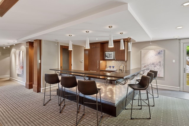 370 Ferndale Rd W, Wayzata, MN 55391 - bar featuring stainless steel microwave, baseboards, dark colored carpet, decorative backsplash, and recessed lighting