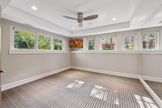 370 Ferndale Rd W, Wayzata, MN 55391 - empty room featuring baseboards, ceiling fan, carpet, a tray ceiling, and recessed lighting