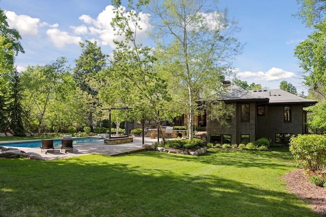 370 Ferndale Rd W, Wayzata, MN 55391 - view of grassy yard featuring a patio and an outdoor pool