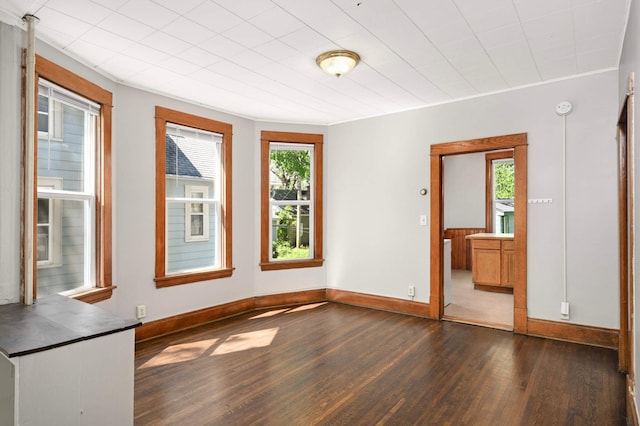 857 Oakdale Ave, Saint Paul, MN 55107 - empty room with dark wood-style flooring and baseboards