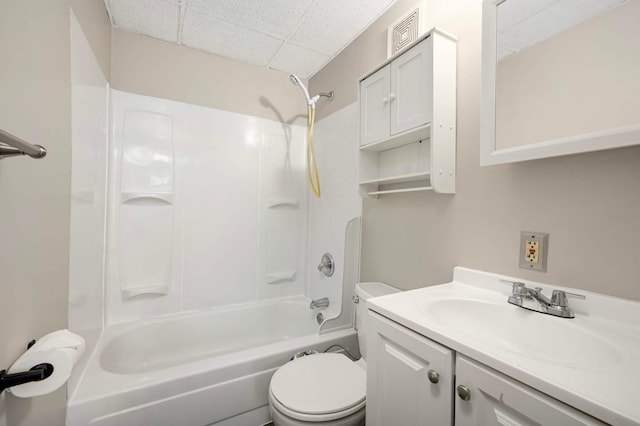 857 Oakdale Ave, Saint Paul, MN 55107 - full bathroom with a paneled ceiling, toilet, washtub / shower combination, and vanity