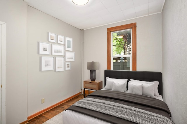 857 Oakdale Ave, Saint Paul, MN 55107 - bedroom featuring dark wood-style flooring and baseboards