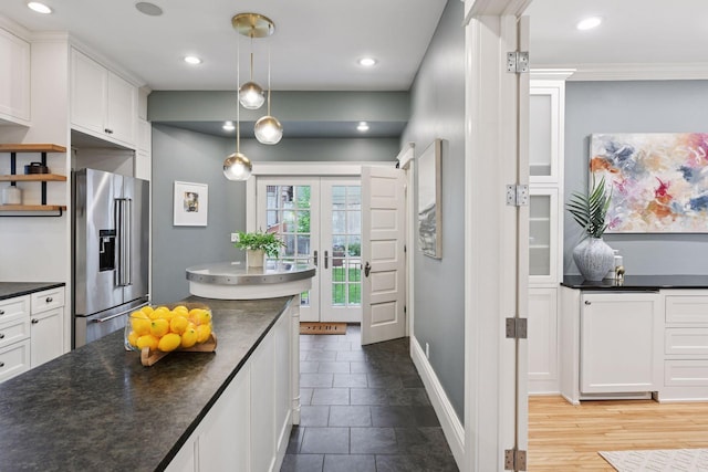 1929 Humboldt Ave S, Minneapolis, MN 55403 - kitchen featuring high end fridge, dark countertops, white cabinetry, and recessed lighting