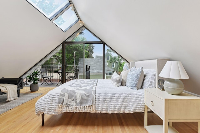 1929 Humboldt Ave S, Minneapolis, MN 55403 - bedroom with a skylight, lofted ceiling, and wood finished floors