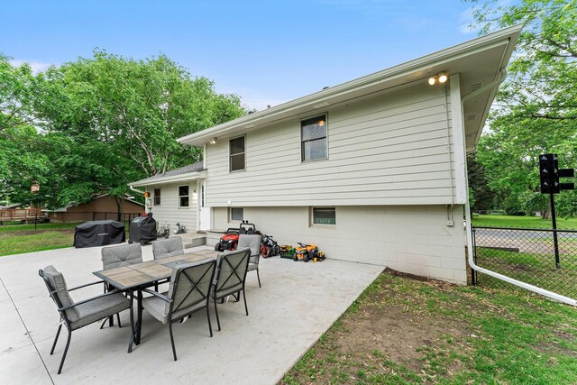 713 9th St NW, Buffalo, MN 55313 - view of patio / terrace featuring area for grilling and outdoor dining area