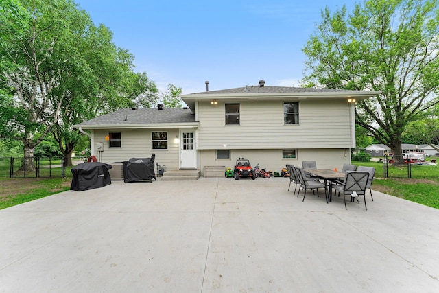 713 9th St NW, Buffalo, MN 55313 - back of house with entry steps and a patio