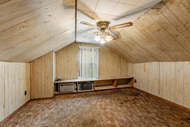 909 14th St S, Benson, MN 56215 - additional living space with wooden walls, vaulted ceiling, ceiling fan, cooling unit, and carpet