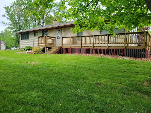 109 155th Ave, Beaver Twp, WI 54889 - view of green lawn with a wooden deck and stairway